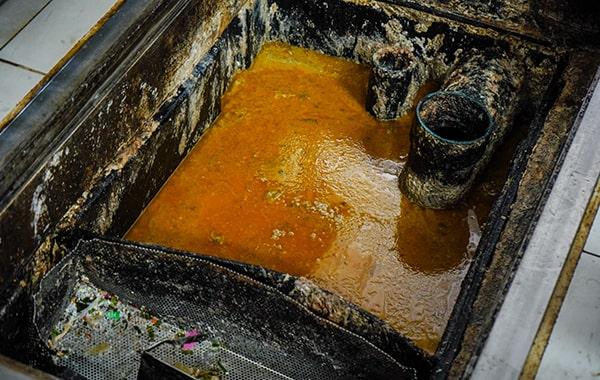 you should schedule grease trap cleaning for your dining establishment a minimum of every 90 days to prevent buildup